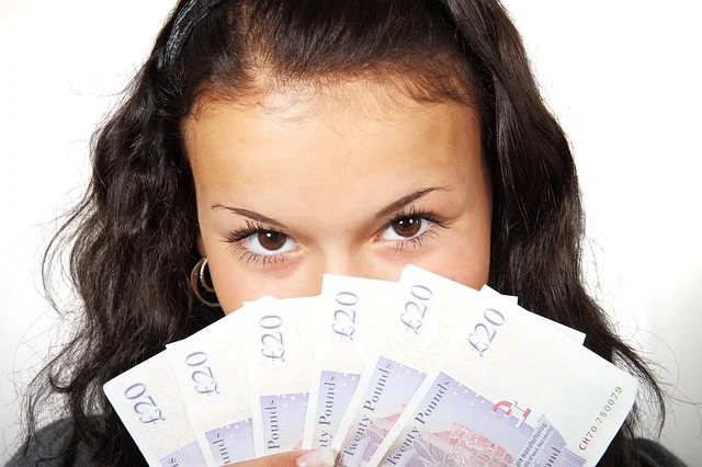 Stack of banknotes — can you actually afford to breed cats?